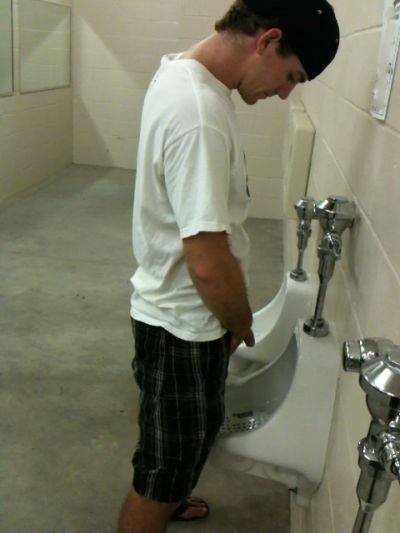 guy caught peeing public urinal spycam