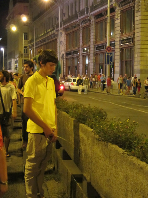 guy peeing street