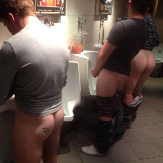 Men caught peeing in bathroom