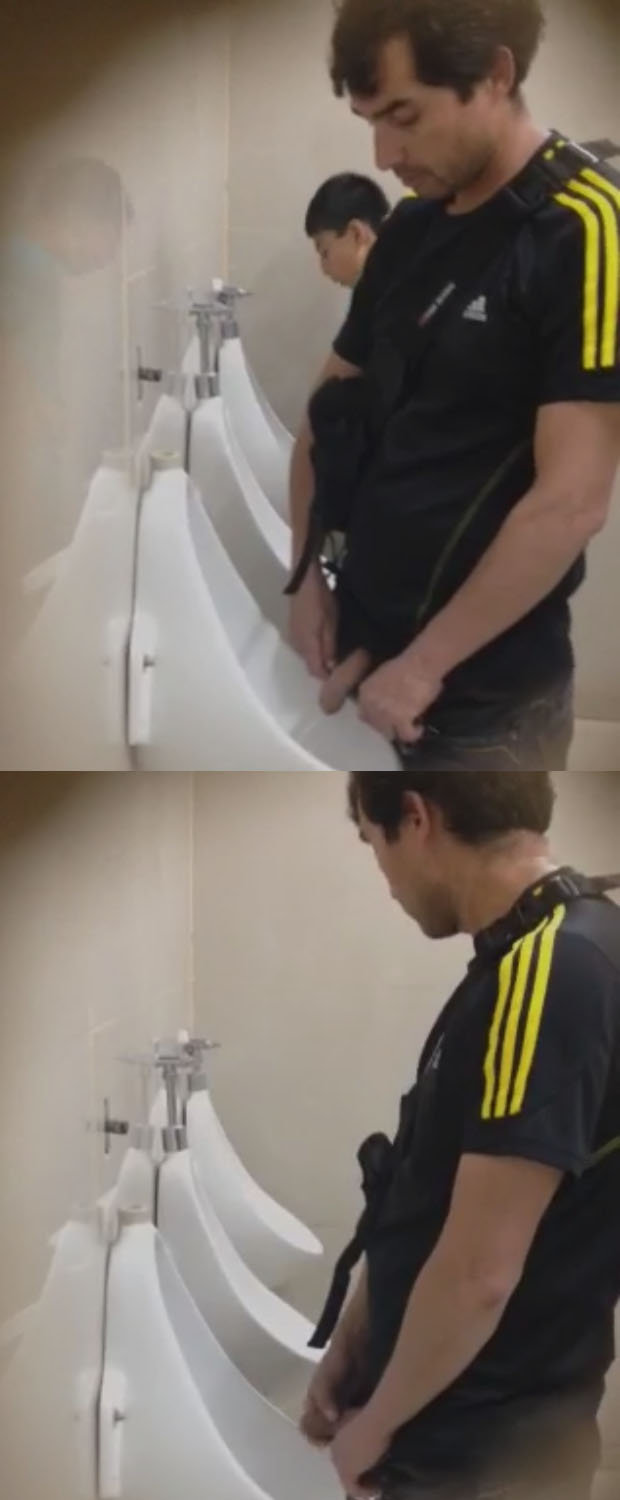guy peeing public urinal