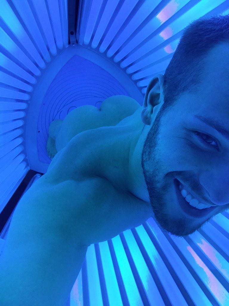 guy naked tanning bed