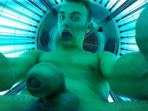 naked guy tanning bed