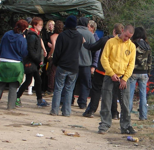 dude peeing in public park