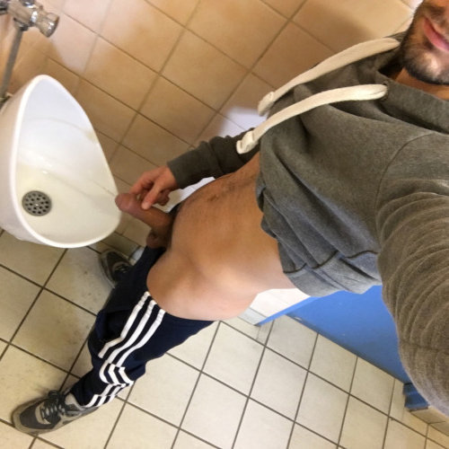 straight guy shows his boner urinal