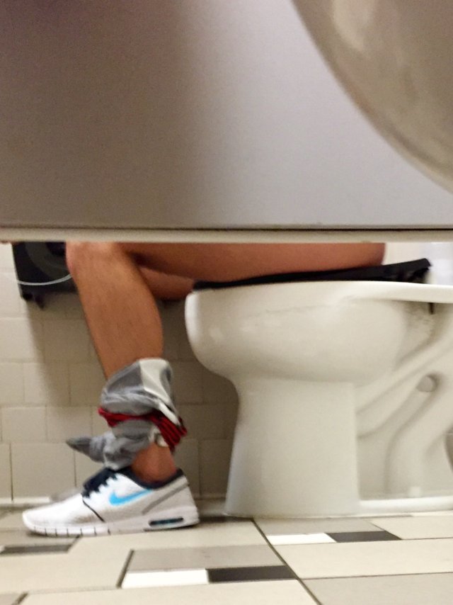 guy caught sitting bowl gym toilet