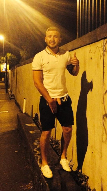 guy peeing public street