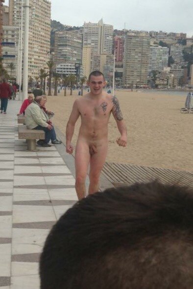 guy running naked city