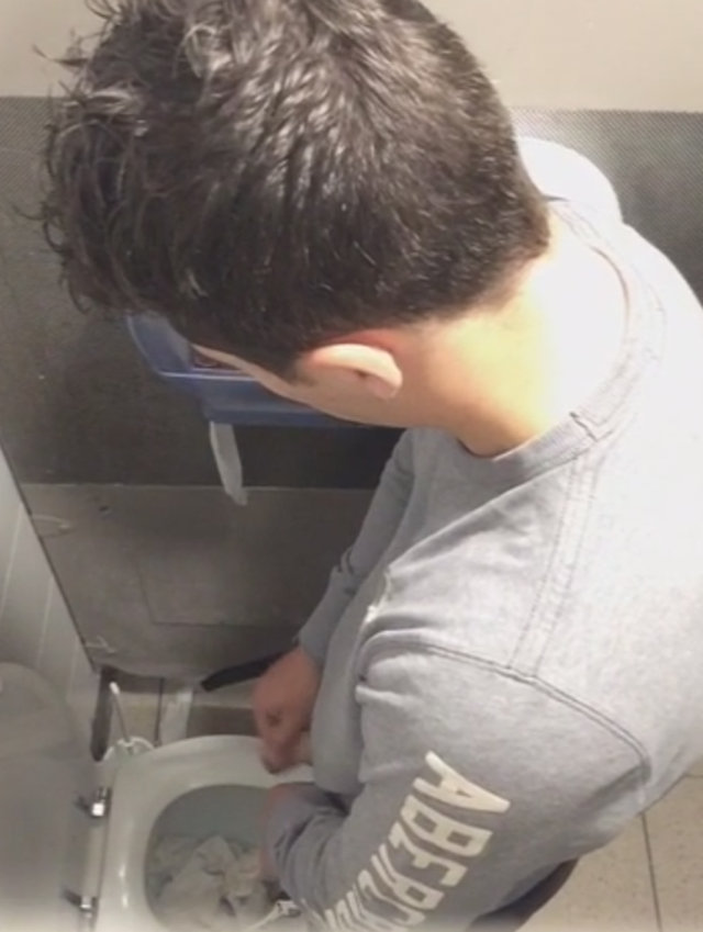 guy caught peeing public bathroom