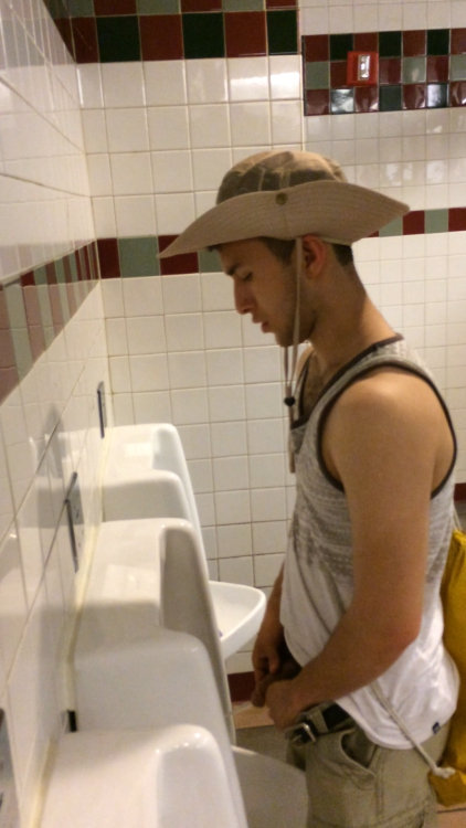 young-dude-caught-peeing-urinals-spycam