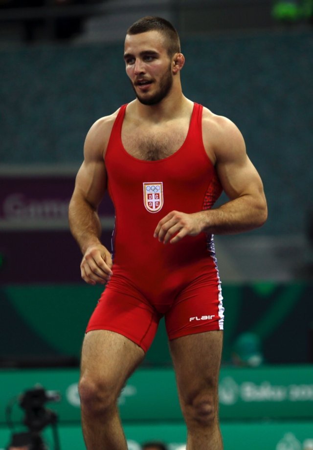 muscled-fighter-spandex-singlet-bulge