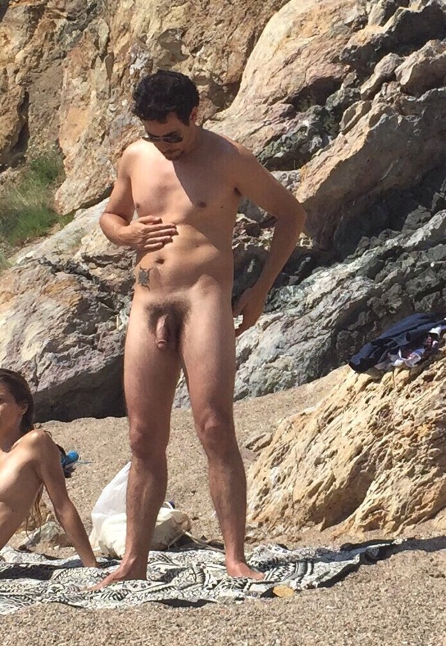 straight-nudist-man-caught-beach