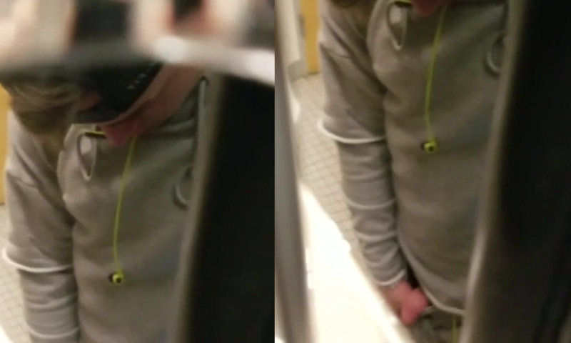 guy caught peeing urinal