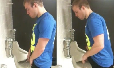 unaware guy caught peeing at the urinals