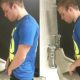 unaware guy caught peeing at the urinals