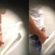spy on guy with big cock peeing at urinal