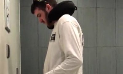 bearded man caught peeing at the urinal in public toilet by a spycam