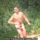 nudist man caught playing naked frisbee at the beach