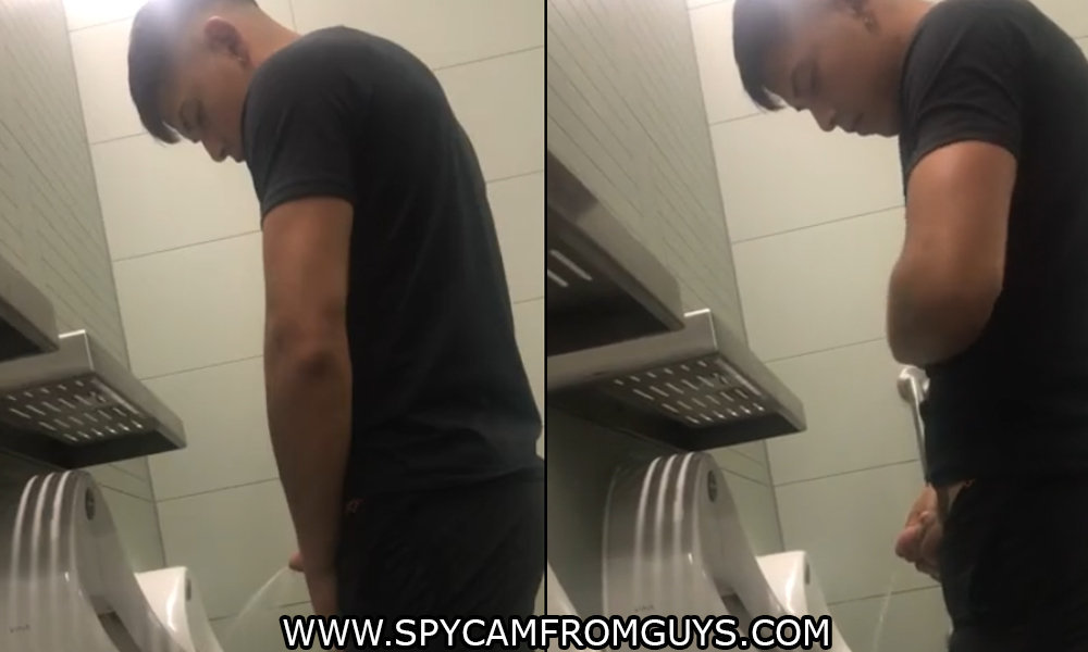young dude caught peeing urinal