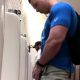 muscled stud caught peeing urinals