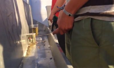 guys caught peeing at the outdoor urinals