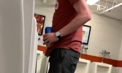 spy on guy caught peeing at urinals