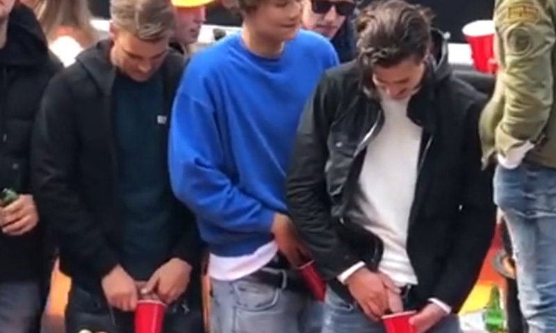 guys caught peeing in public