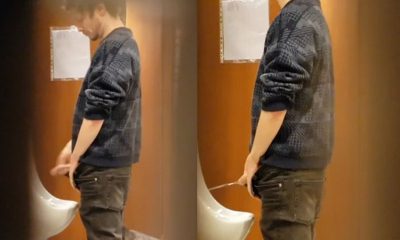 spy on hung guy peeing at the urinal