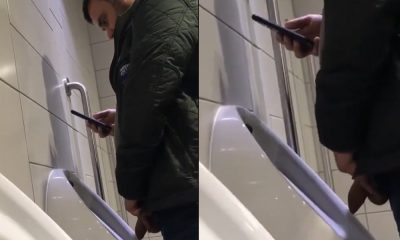 spy on uncut man peeing at urinals