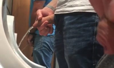 guy with long uncut penis caught peeing urinal