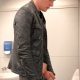 uncut guy proud to show off cock while peeing at urinals