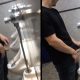 guy peeing and stretching his foresking at urinal
