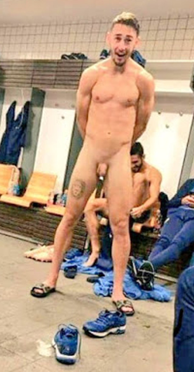 footballer showing off in locker room