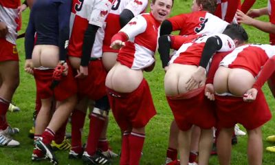 rugby players mooning after game