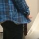 guy peeing and playing with foreskin at urinals