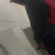 hung guy caught taking a pee at urinal