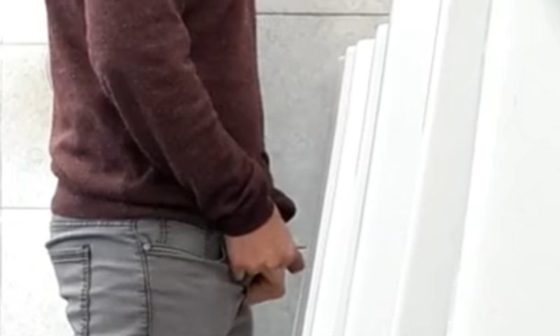 nice dude caught pissing at urinal