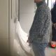 uncut man caught peeing in busy restroom