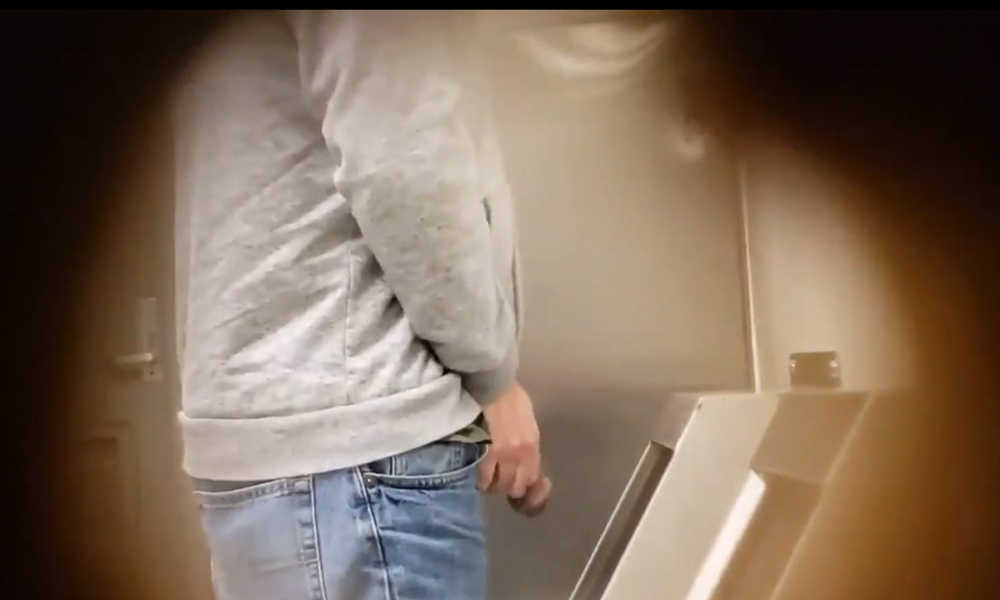 man with monster cock caught peeing at urinal