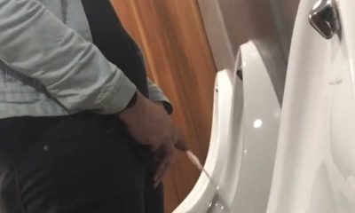 tall hung uncut guy caught peeing urinal