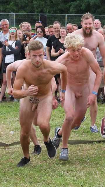 Danish guys running naked for the Roskilde festival.