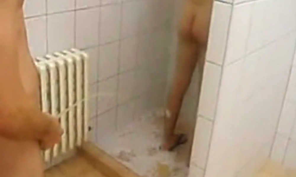 guy peeing on team mate in shower