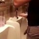 guy caught peeing in club restroom