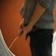 guy with thick uncut cock caught peeing urinal