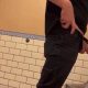 guy peeing at urinal with cock and balls out