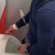 this guy reveals a huge cock at urinals