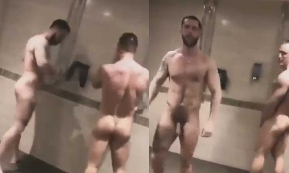two muscled studs caught showering