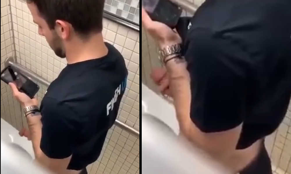 horny guy wanking his hard cock in public toilet