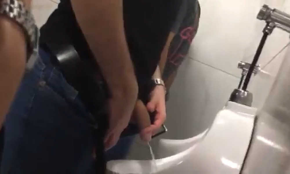 latin guy with huge cock caught peeing by spycam at urinal