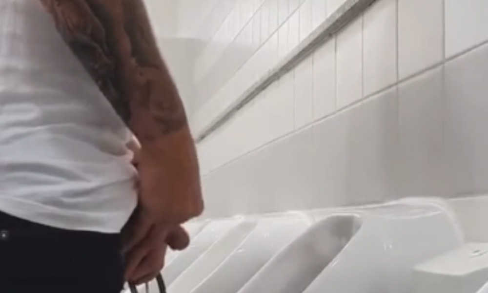 tattooed uncut guy caught peeing at urinal