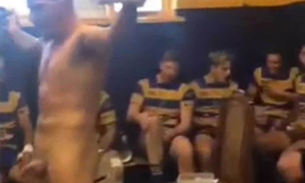 rugby player shows off his cock in locker room during celebration